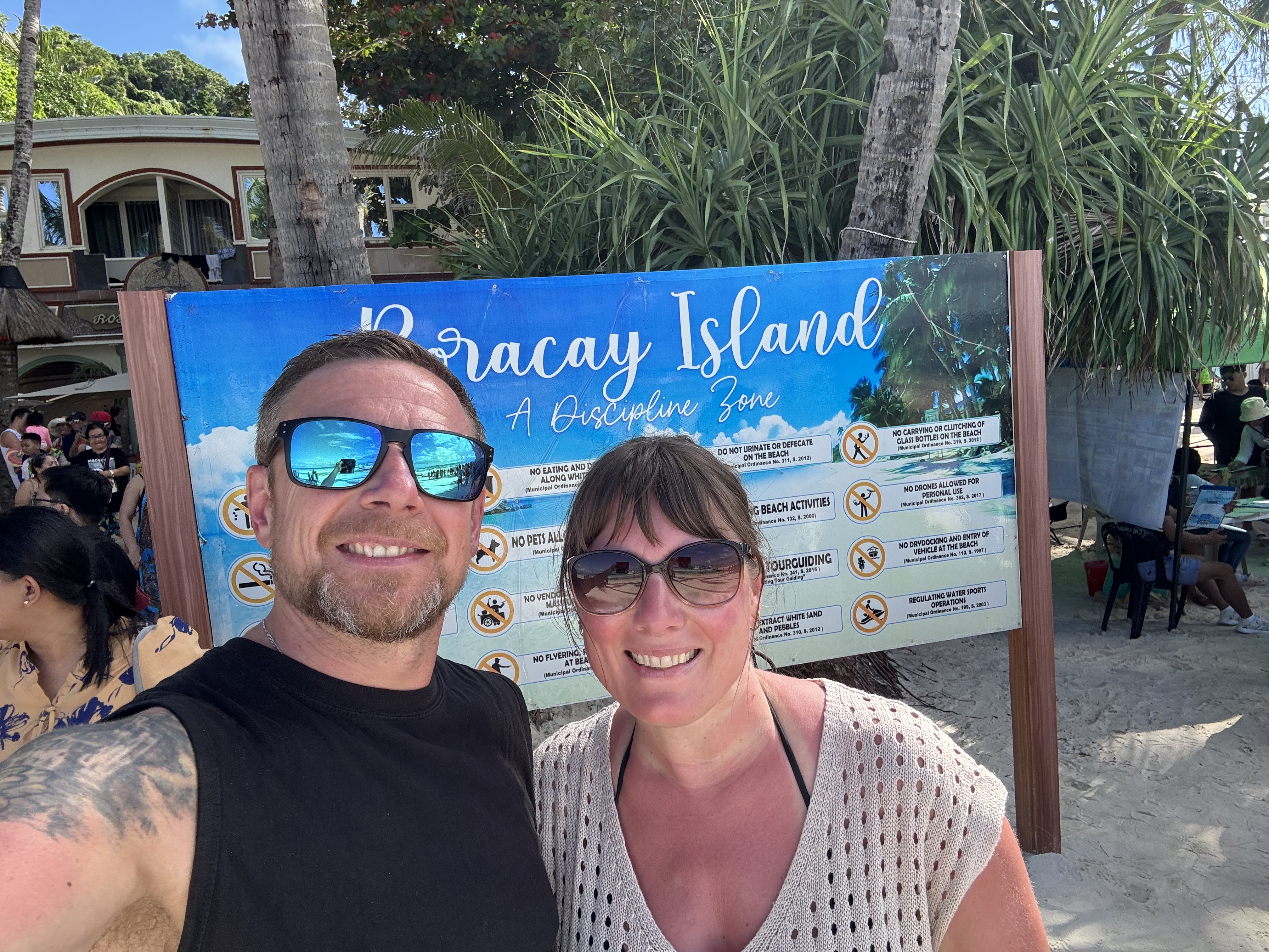 A Boracay arrival moment with the island sign.
