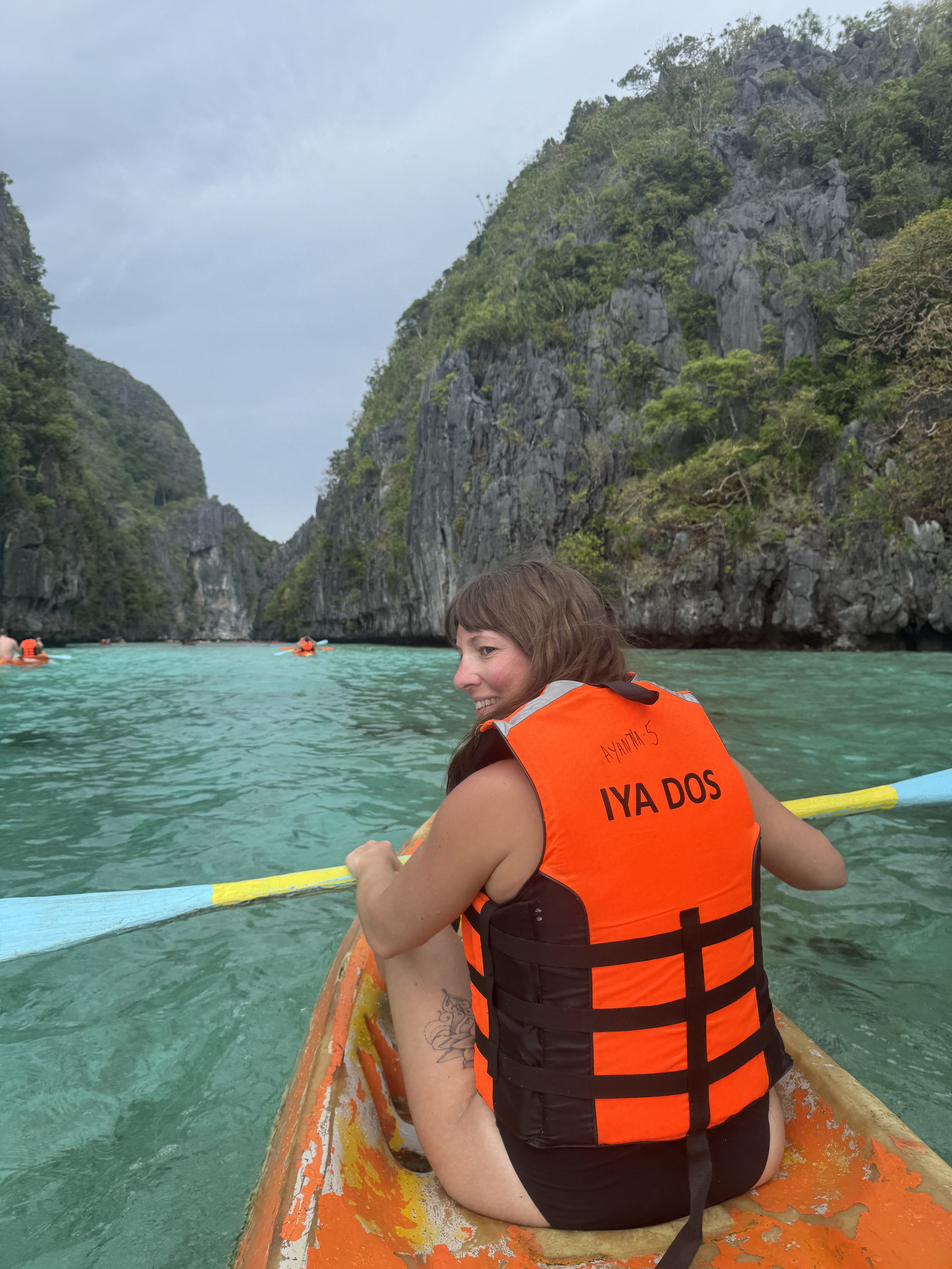 El Nido: paddling into Bacuit Bay beneath towering limestone cliffs.