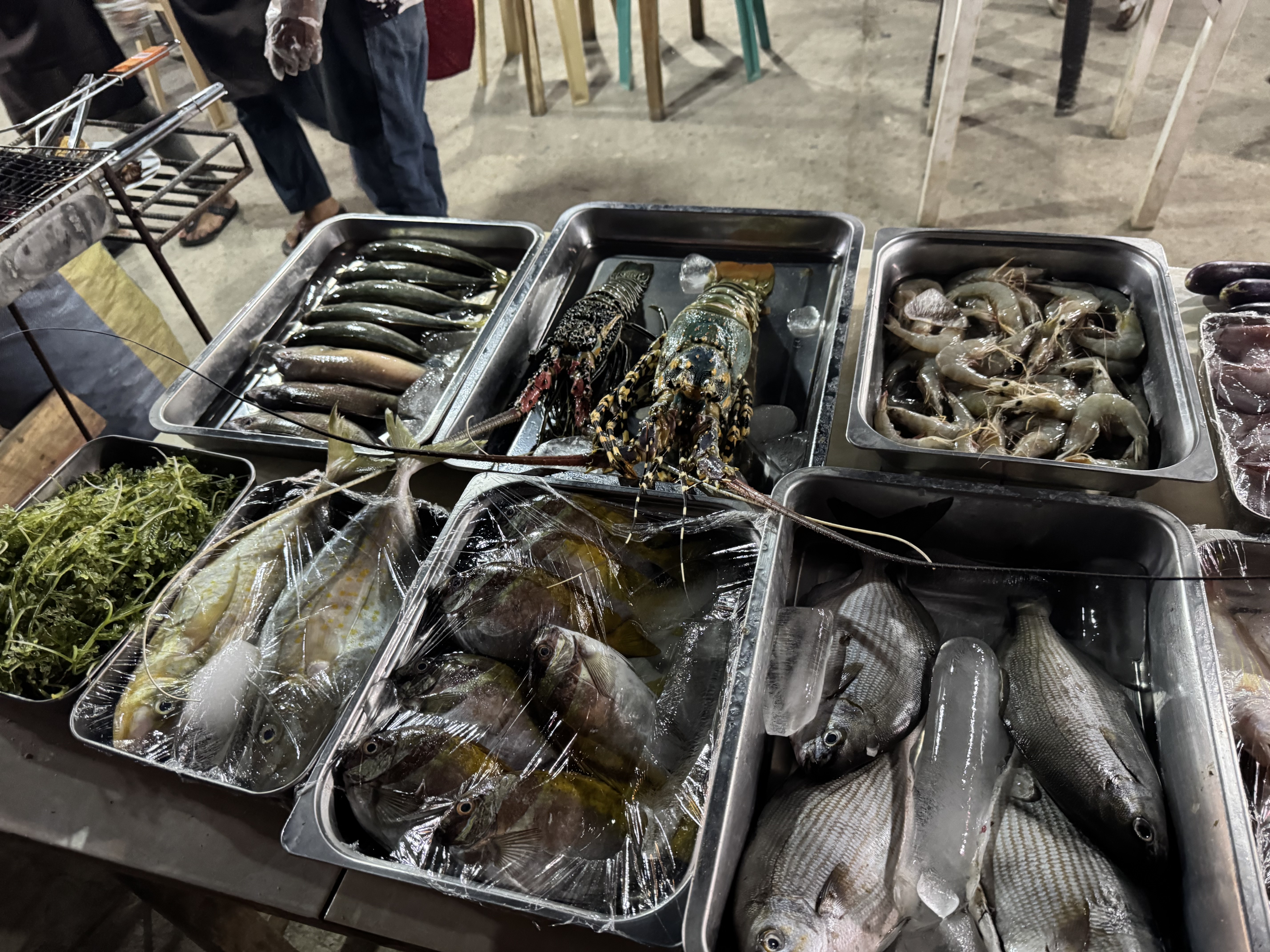 A local seafood spread — one of the pleasures of island travel.