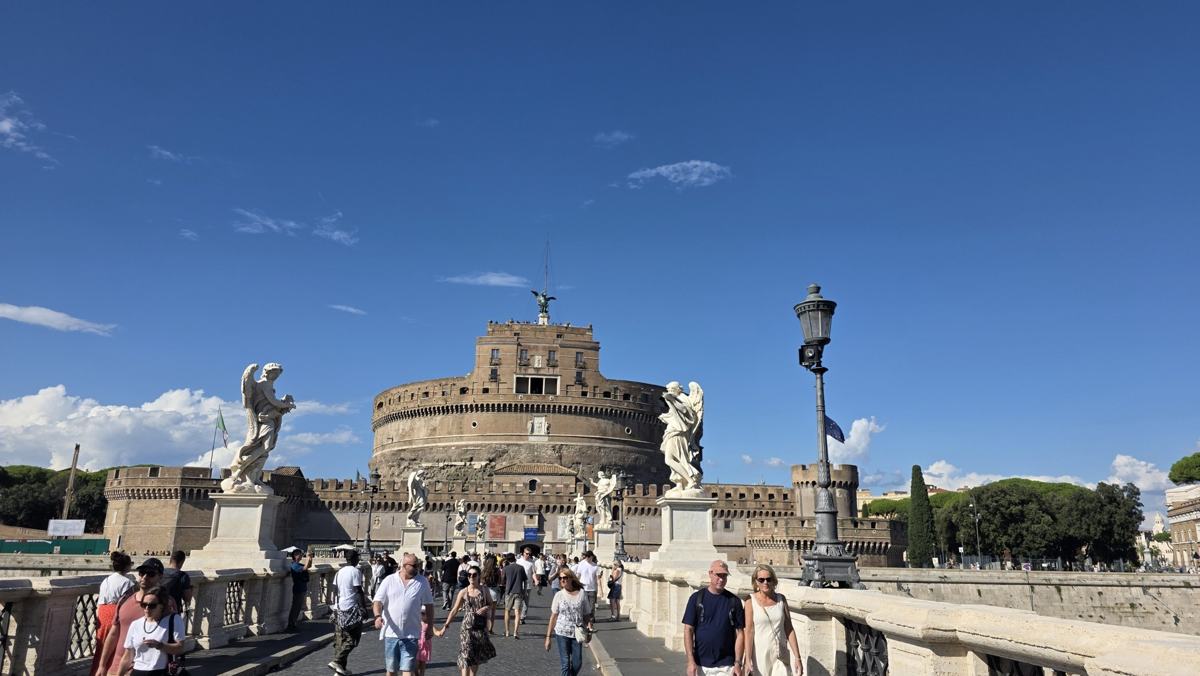 Castel Sant'Angelo under a clear afternoon sky.
