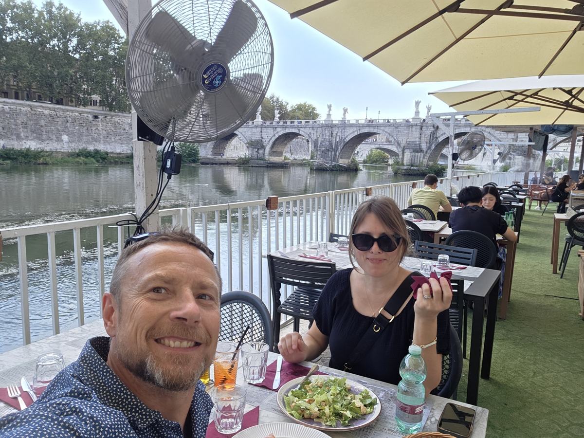 Together over lunch beside the Tiber.
