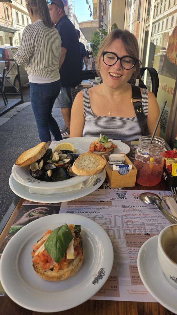 Seafood and tomato-topped bread during our Naples day.