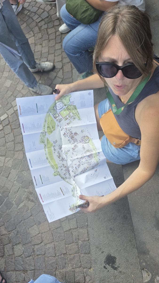 Jenn checking the site map before exploring.