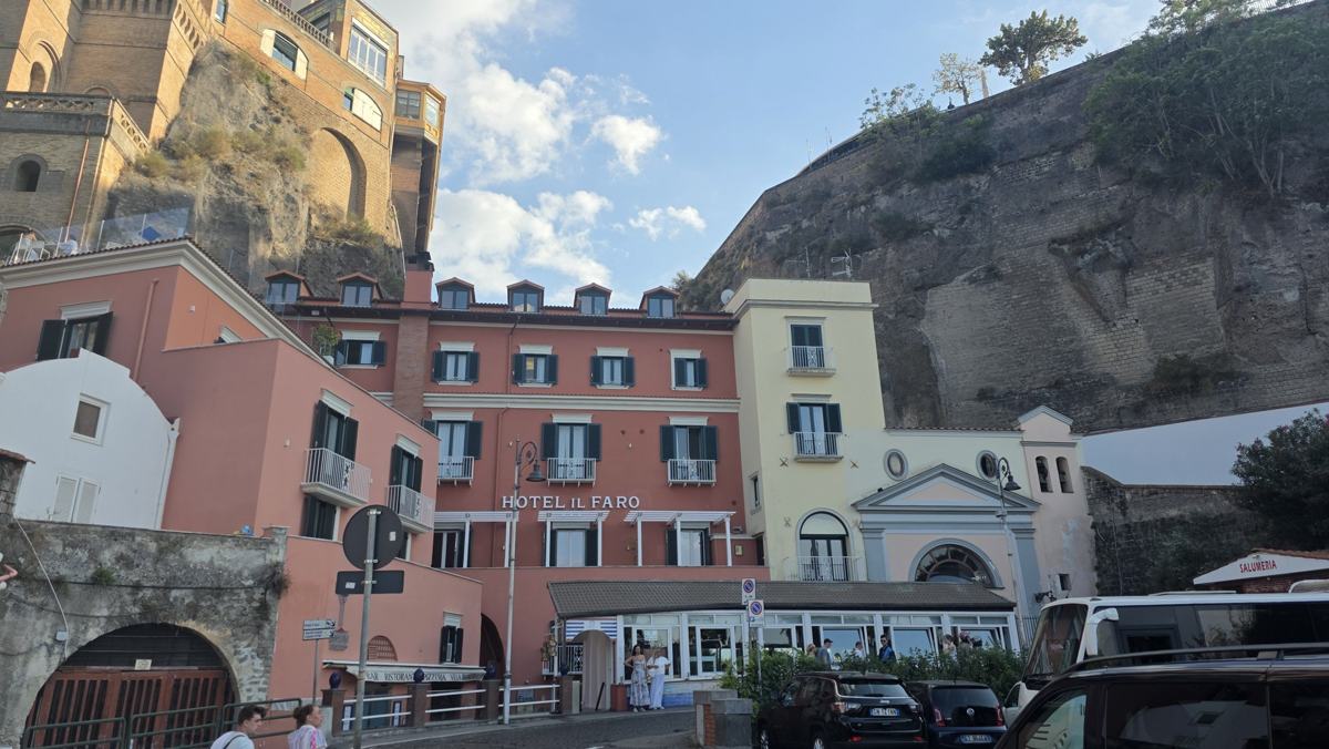 Waterfront buildings tucked beneath the cliffs at Sorrento.