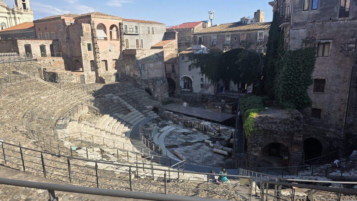 Stone seating and the stage area of the ancient theatre.