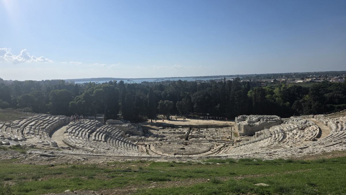 A wider view over the theatre seating.